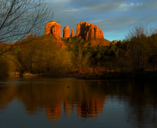 gün batımı, kırmızı kayalar içeren Ücretsiz stok fotoğraf