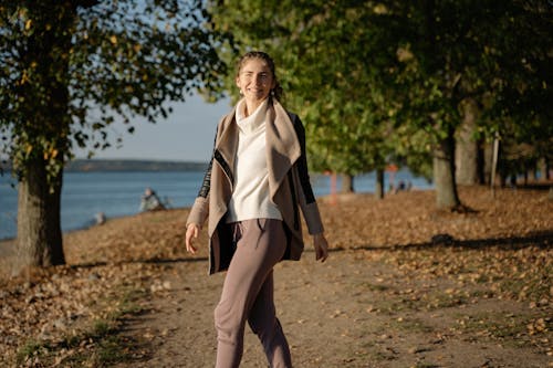 Smiling Woman on Footpath