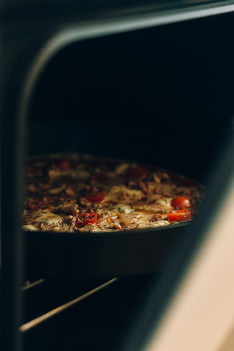 Food On A Baking Tray Inside An Oven