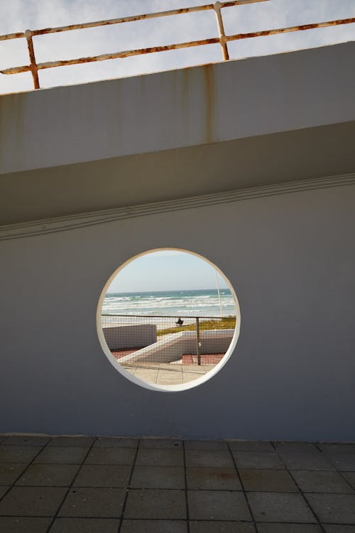 Sky over bridge and sea in daytime