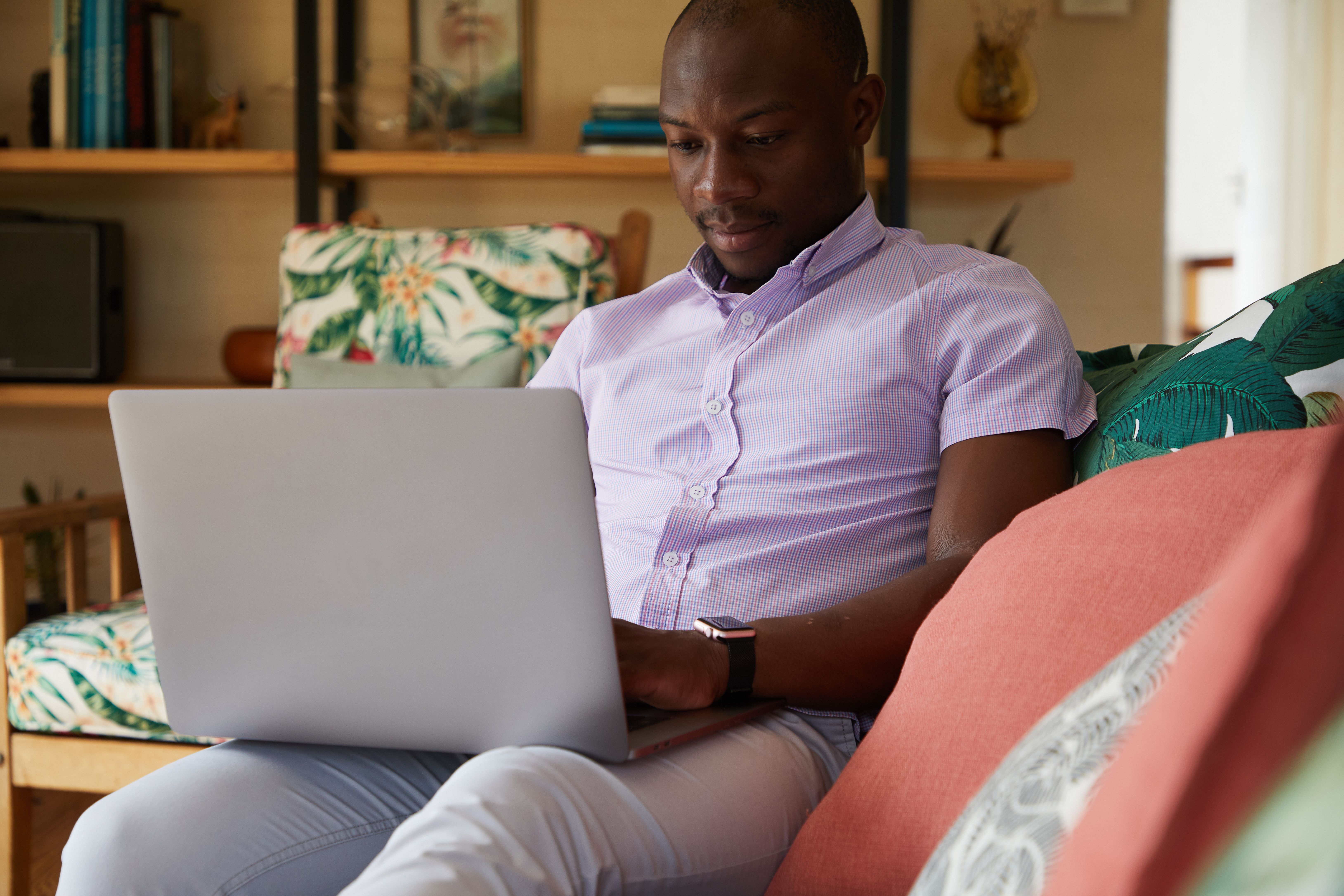 smart shopper comparing furniture prices on laptop