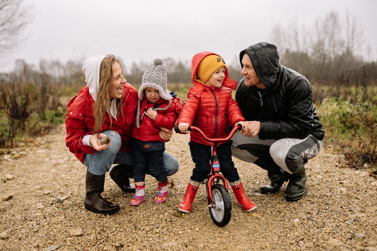 Family enjoying an outdoor bike ride together