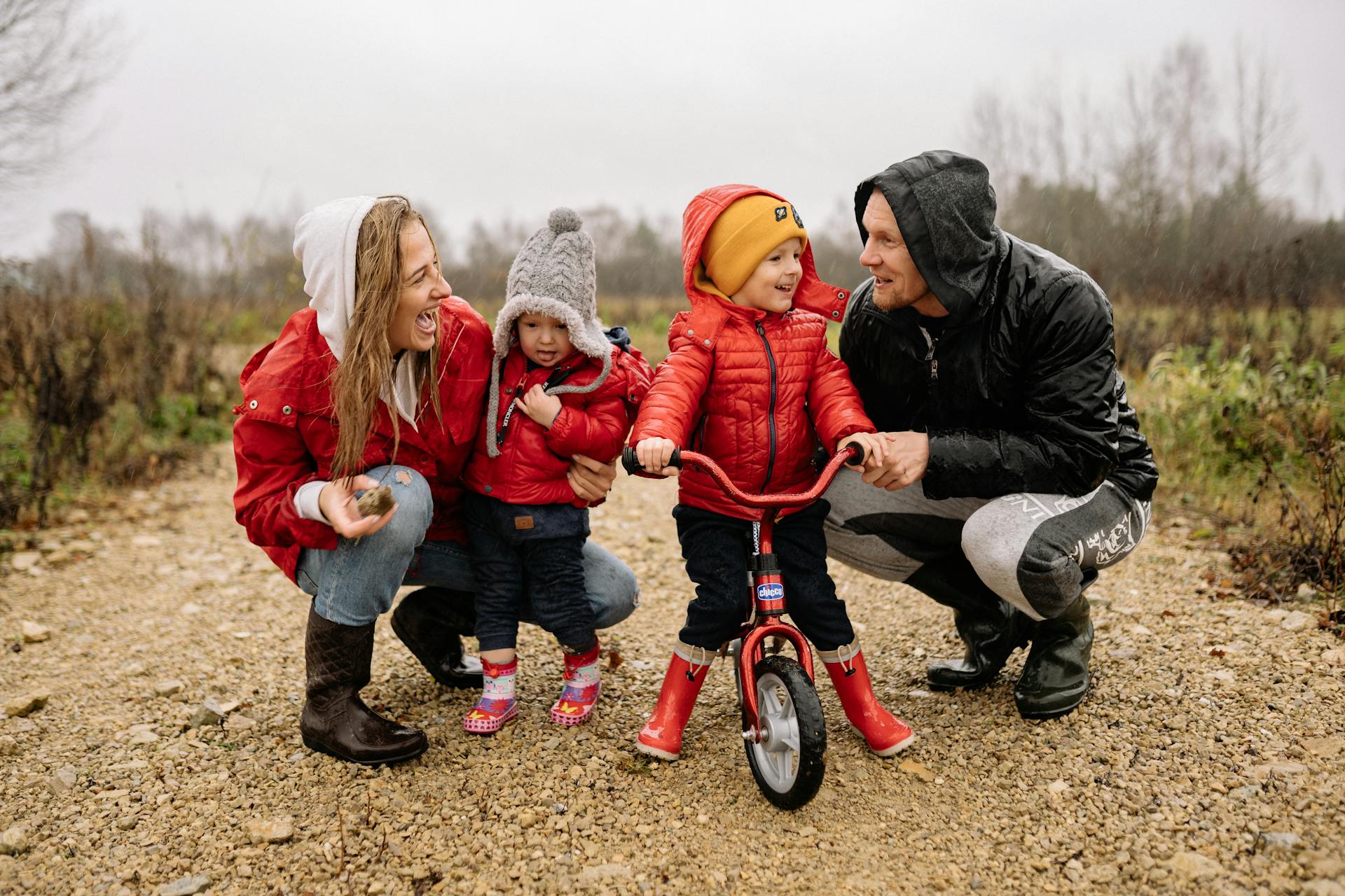 Joyful family bonding in nature, riding bikes and enjoying quality time together.