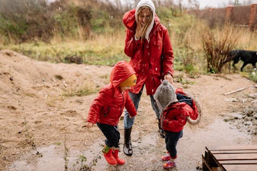 A Family Playing on a Puddle