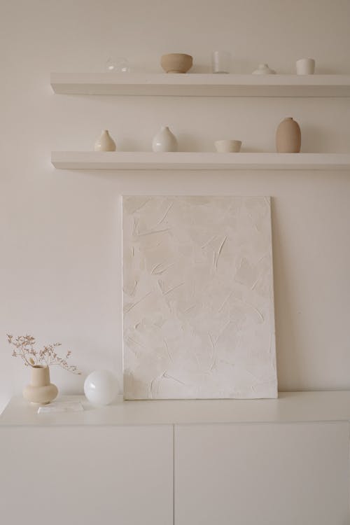 White Wooden Canvas on White Wooden Cabinet