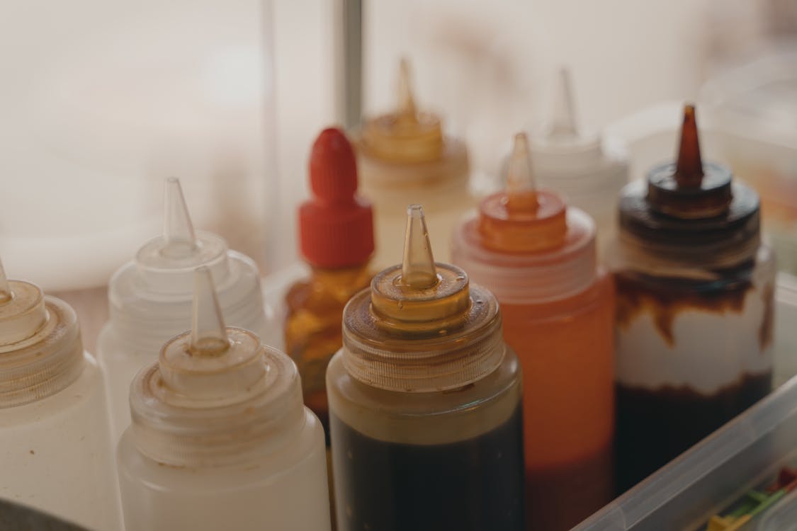 Free Condiments in Squeeze Bottles Stock Photo