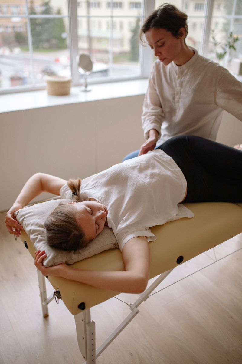 Patient receiving therapeutic massage treatment