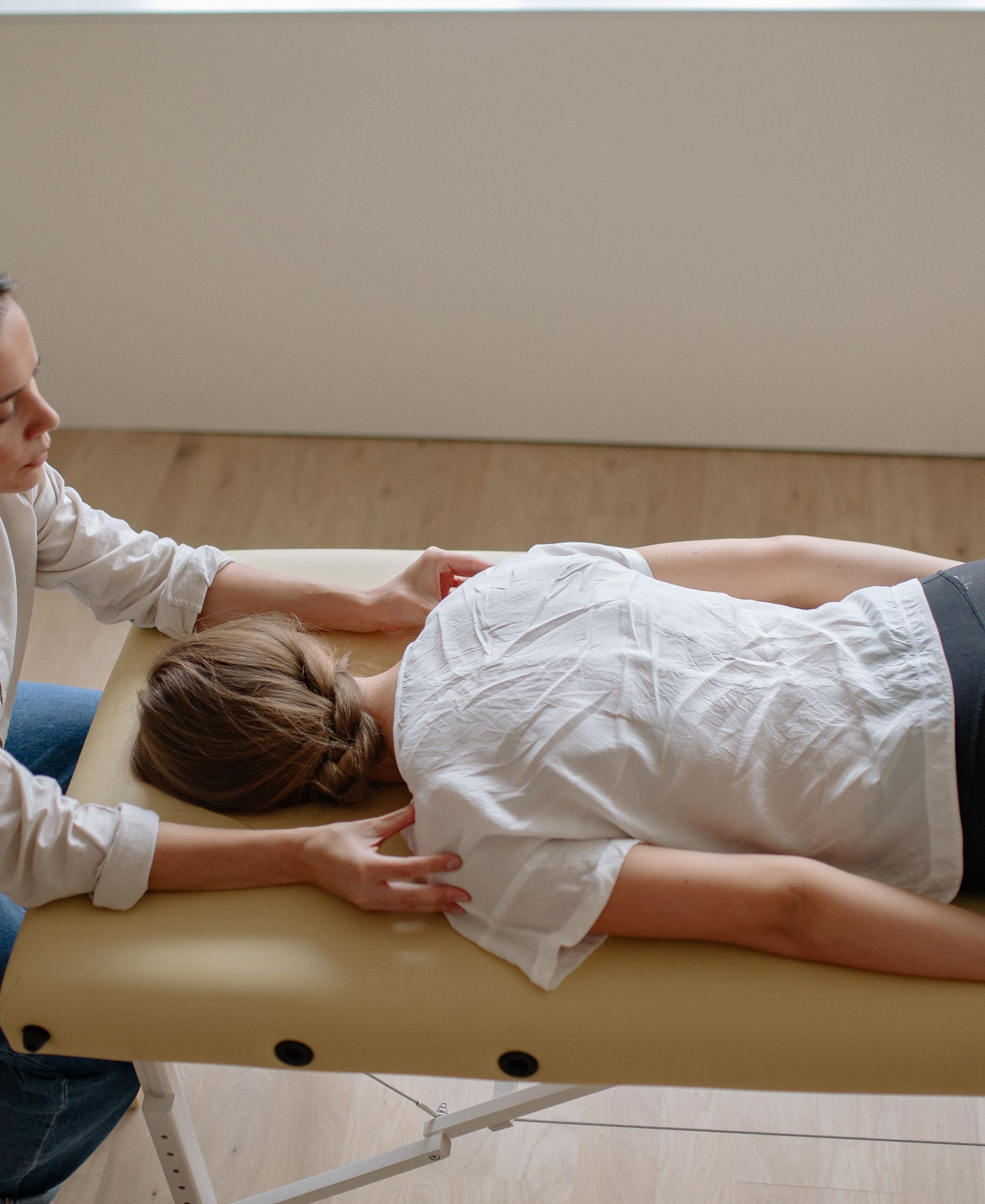 Chiropractor treating a patient
