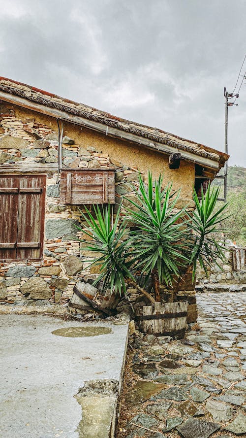 Free Exterior of Old Rustic Stone House Stock Photo