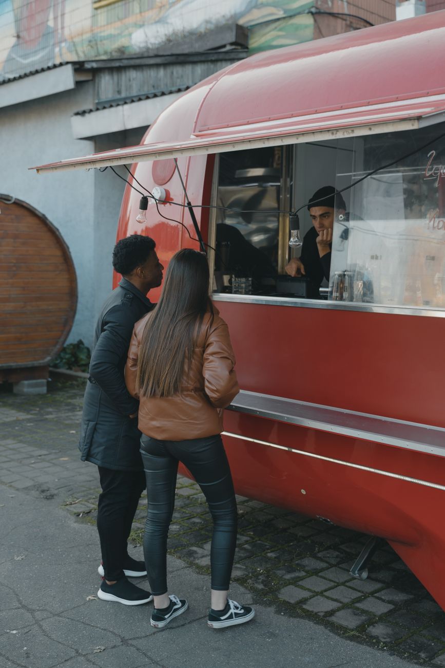 food truck window with line of customers