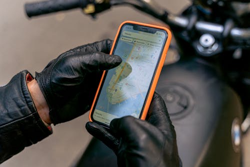 A Biker Using a Cellphone for Navigation