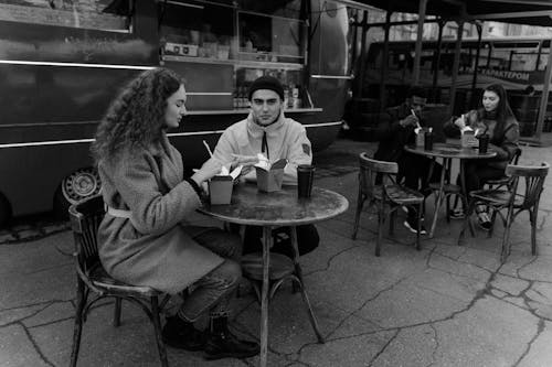 Couples Dining Near a Food Truck
