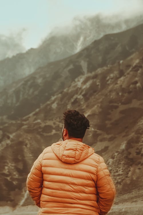 Backside of a Man Wearing a Puffy Jacket