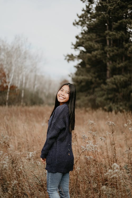 A Woman Posing for an Outdoor Photoshoot