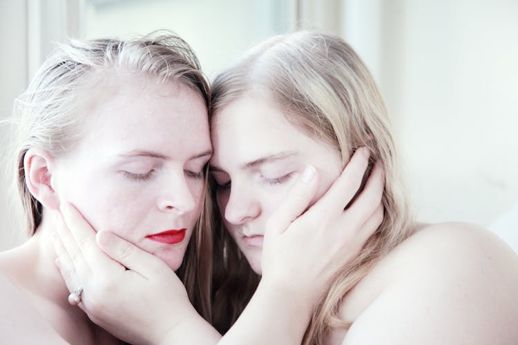 A Woman Couple Cuddling Each Other