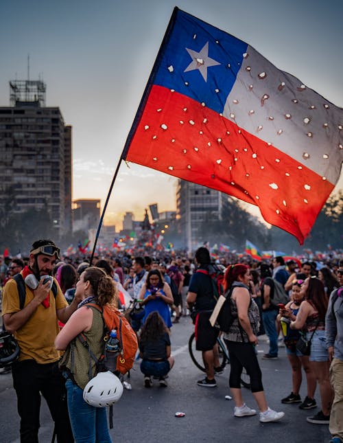 The Chilean Flag Held High in a Rally