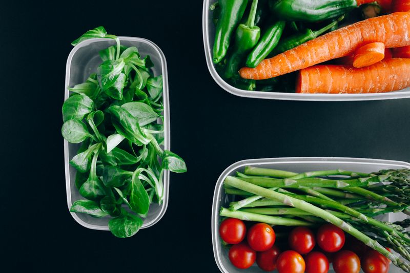 Fresh vegetables in containers