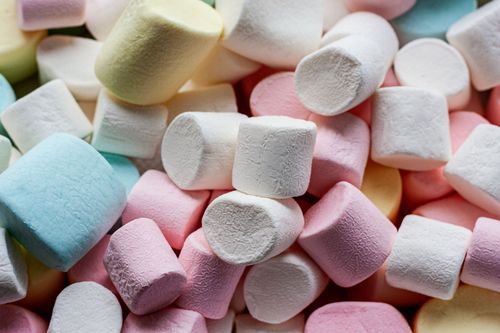 Free A vibrant close-up of soft, colorful marshmallows, showcasing fluffy textures. Stock Photo