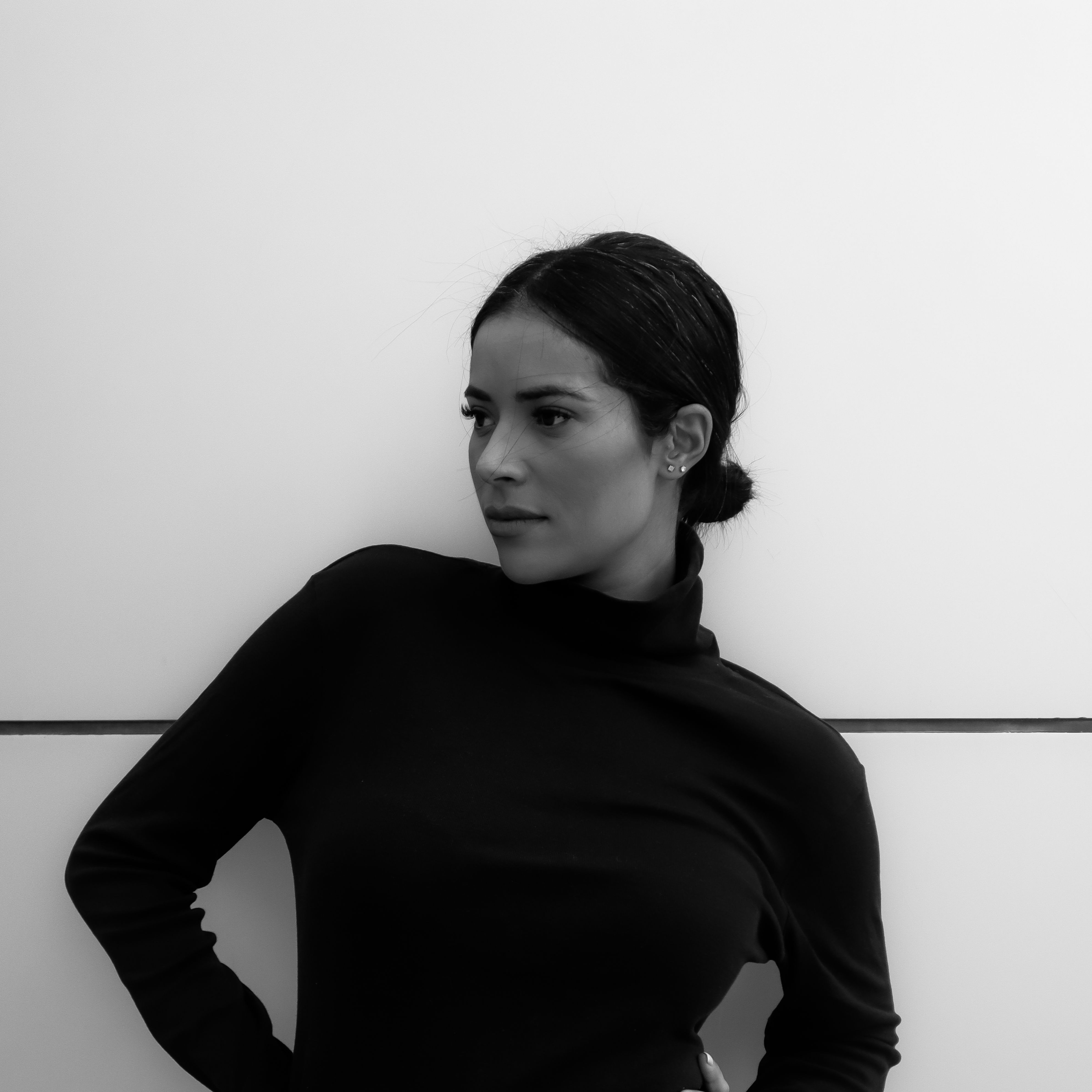 A Woman in Black and White Long Sleeve Shirt · Free Stock Photo