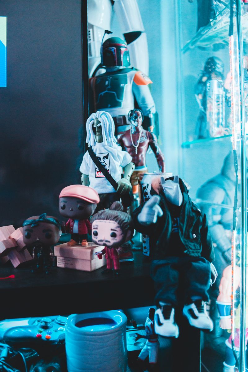 Art toy collection on a shelf showing beginner collectible figures for a designer toy starter guide