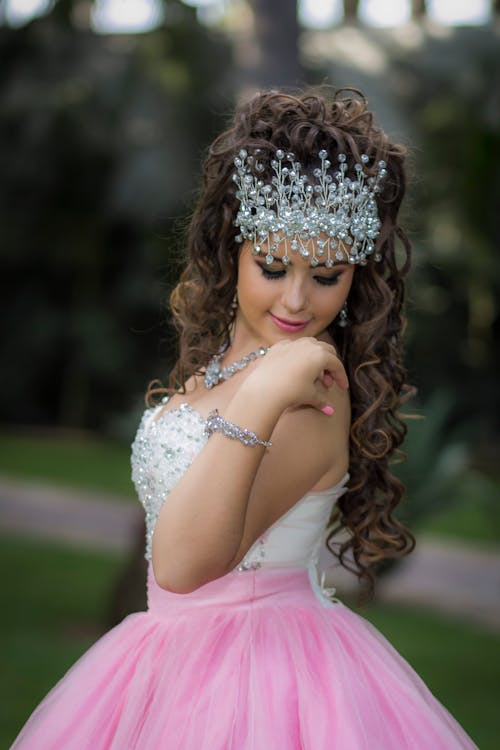 A Young Girl Wearing Crystal Jewelries Posing