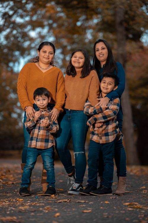 Free Happy family posing in fall attire outdoors in Glen Cove, NY. Stock Photo