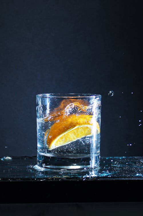 Free A Slice of Lemon on a Glass of Water Stock Photo
