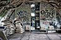 An Abandoned Plane with Vandalized Walls