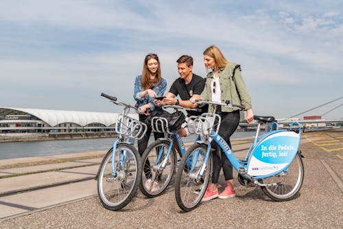 Free Man and Two Women With Bicycles Stock Photo