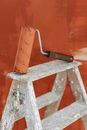 A Paint Roller on a Stepladder