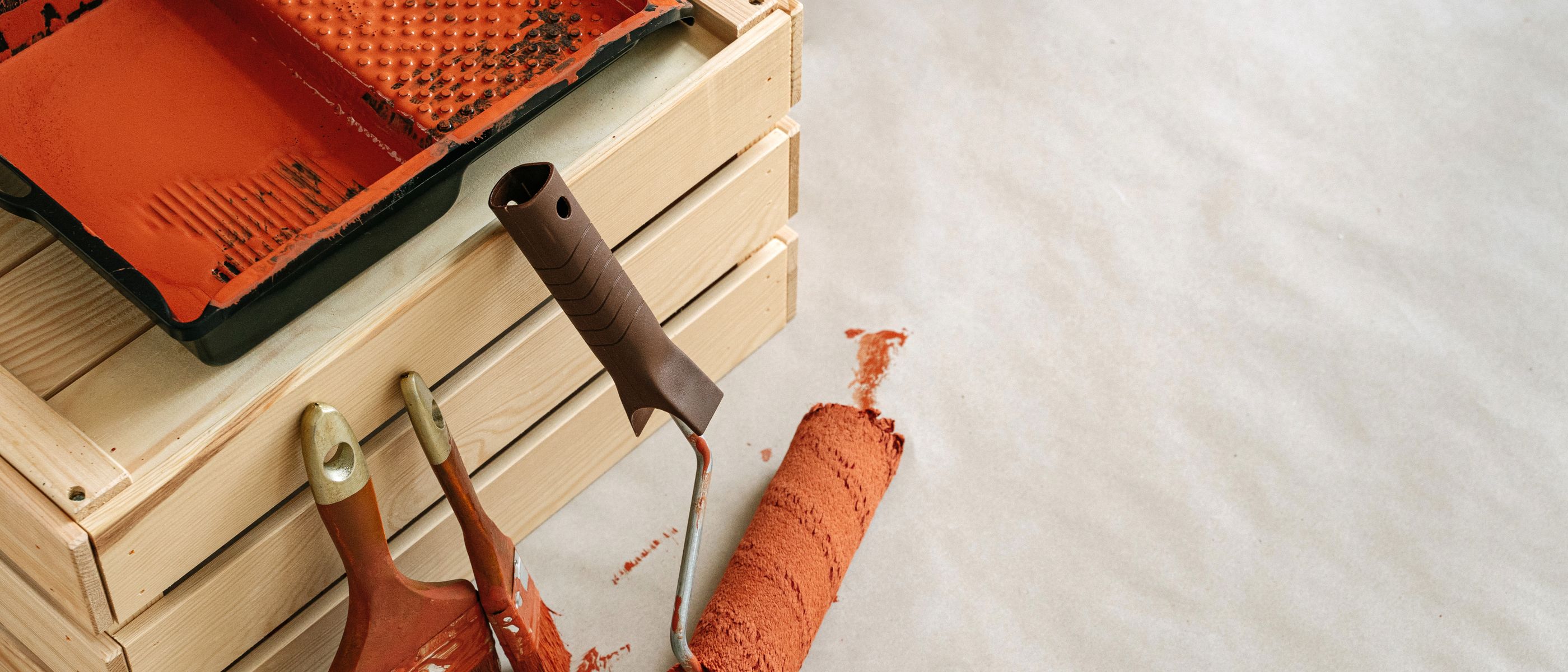Masonry and Render Painting in Upper Walthamstow — a decorator at work mid-project