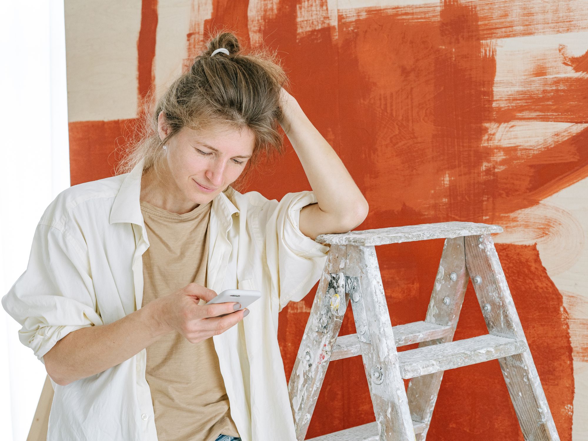 Masonry and Render Painting in Chinbrook, Lewisham — professional painter and decorator at work