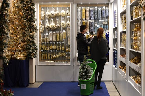 Man and Woman Shopping in the Store