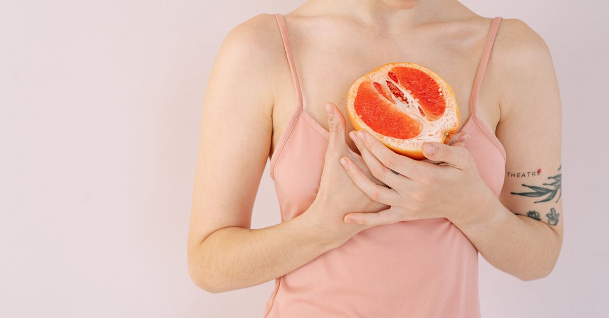A selection of fresh fruits and vegetables on a wooden table.