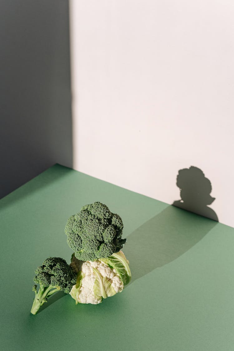 A Broccoli On Top Of A Cauliflower 