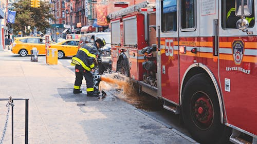 Fireman in Front of Fire Truck