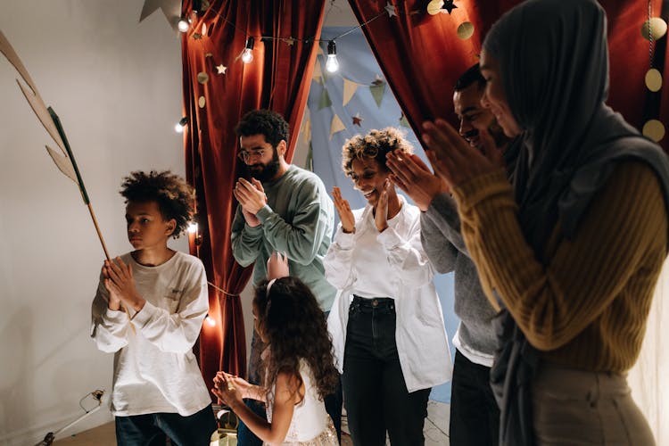 Family Clapping With Their Hands 