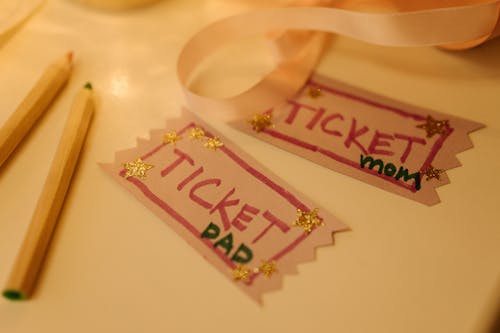 Close Up Shot of Tickets on the Table