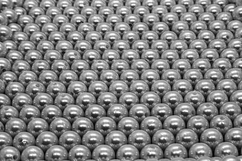 Free A Grayscale Photo of Round Beads Stock Photo