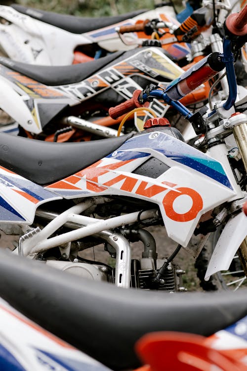 Orange and white dirt bike on sale