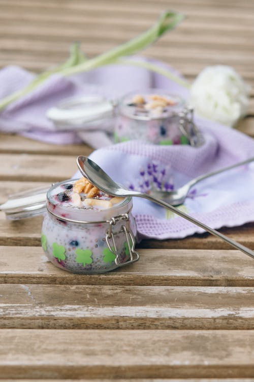A Spoon on a Jar of Delicious Dessert 