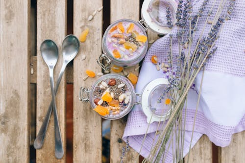 Delicious Jars of Desserts Beside Lavender Flowers