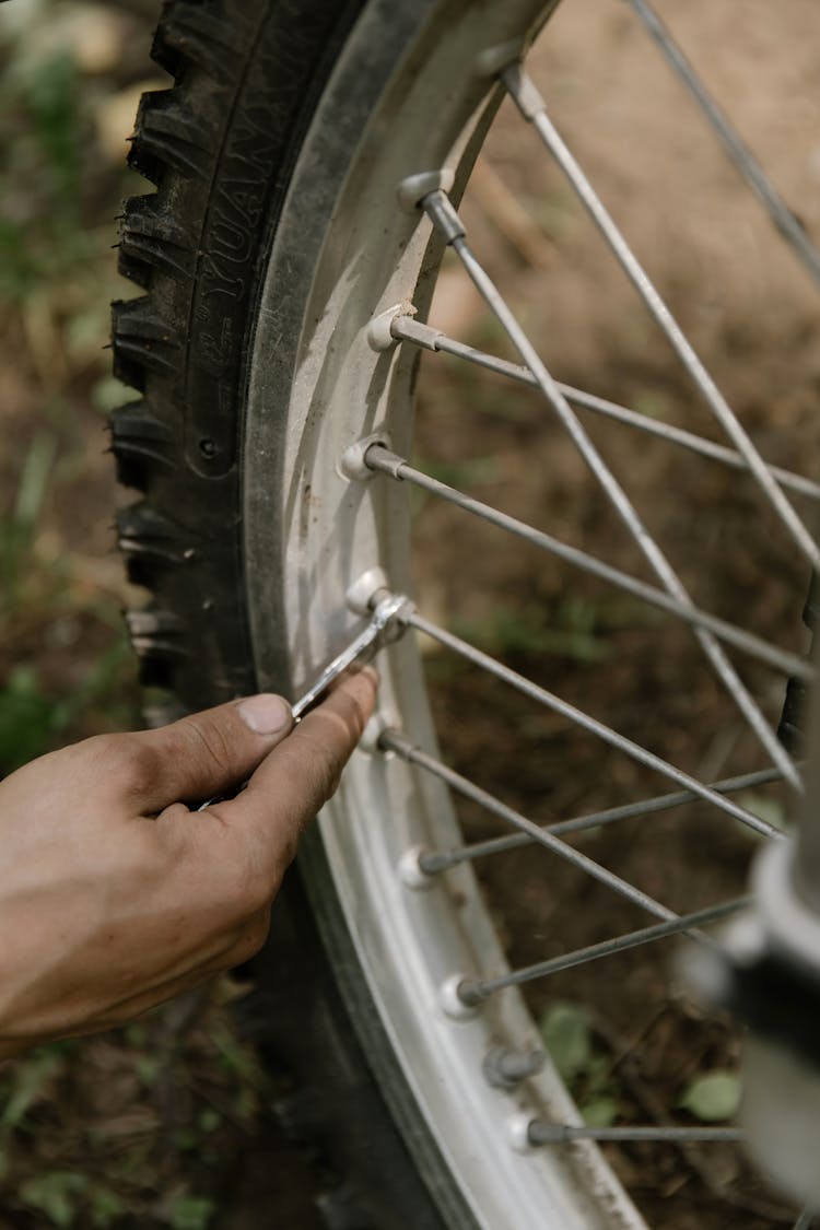 Person Holding A Stainless Tool