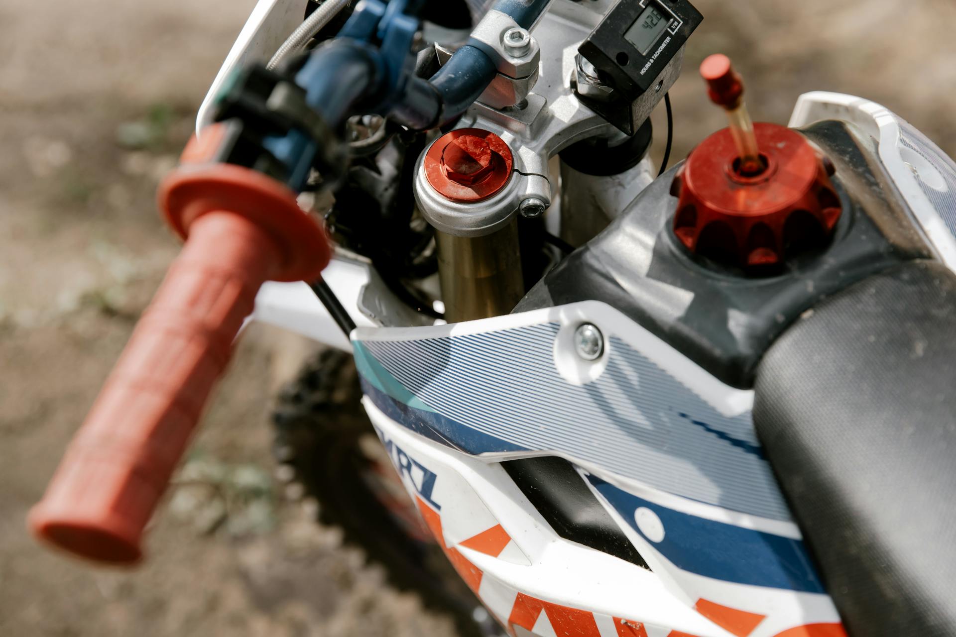 Motocross Bike and Parts in Close Up Photography