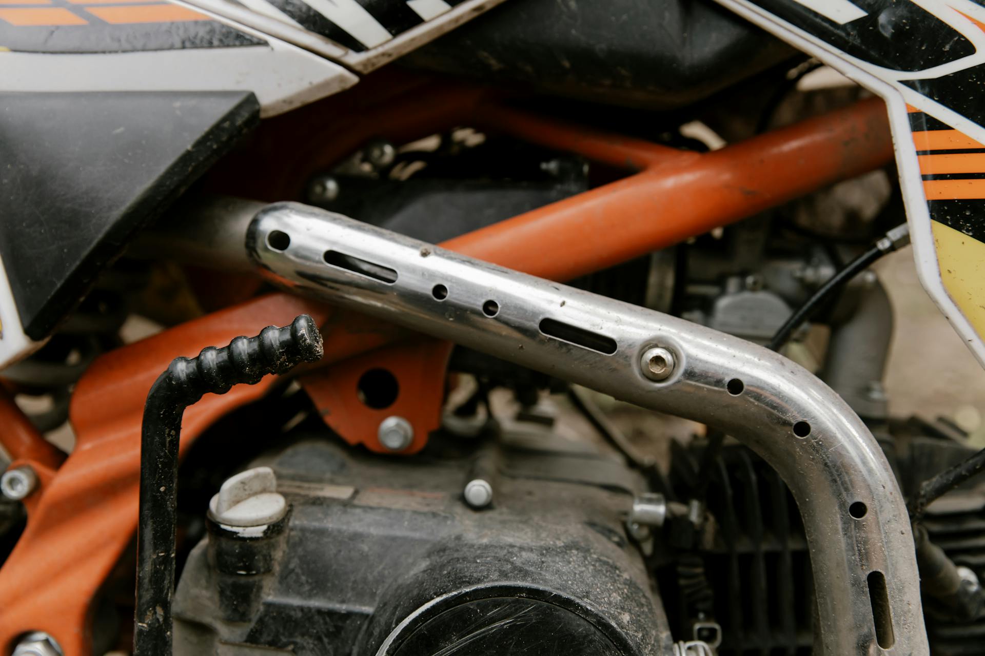 Close Up Photo of an Exhaust Pipe of a Motorbike