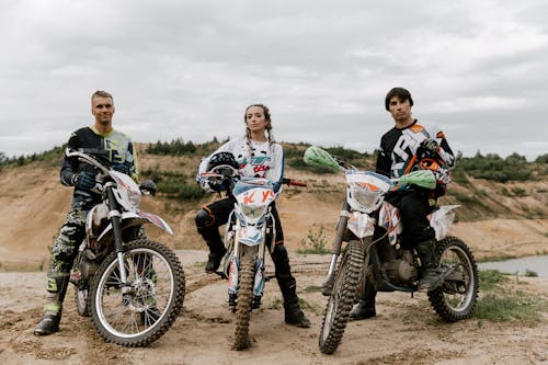 Free Group of People Riding Dirt Bikes Stock Photo
