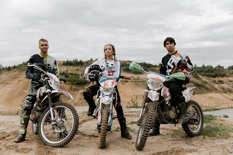 Group Of People Riding Dirt Bikes