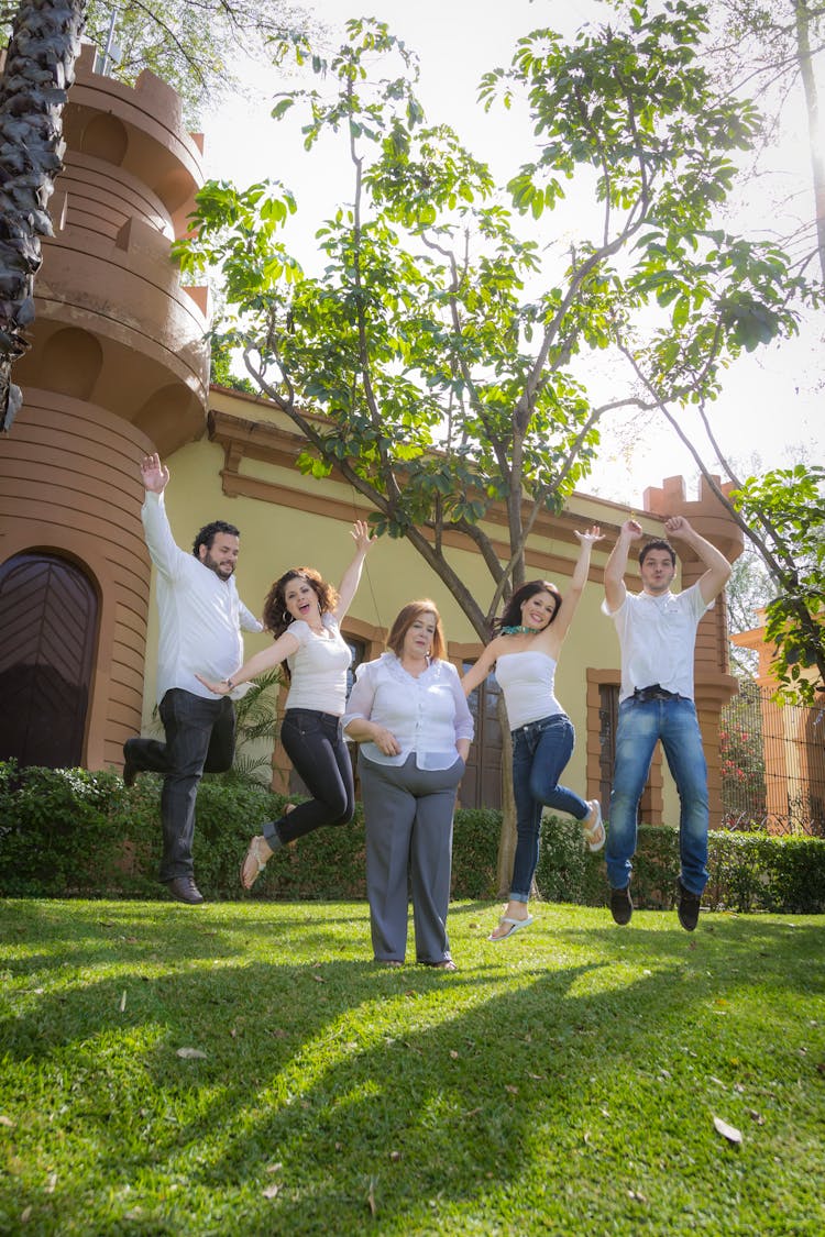 Happy Family Doing A Jumpshot 