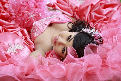 Close-up Photo of Woman in Pink Dress 