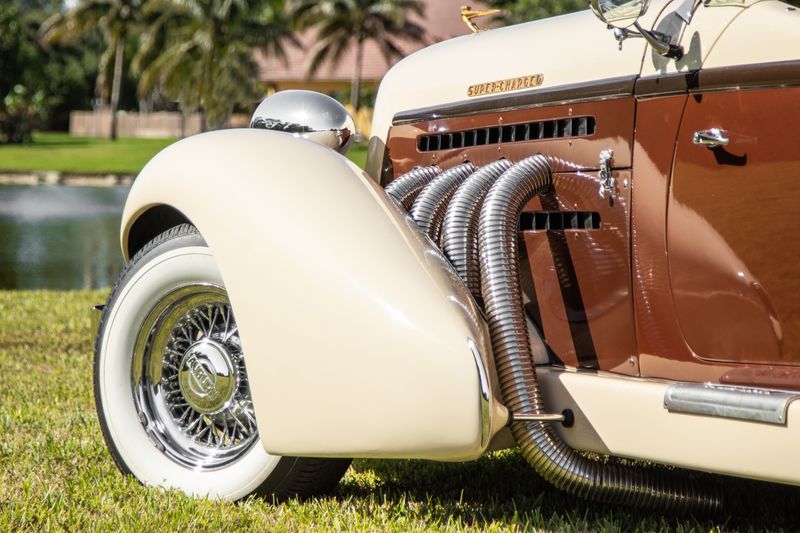 Close-up of vintage supercharged car exterior with chrome details